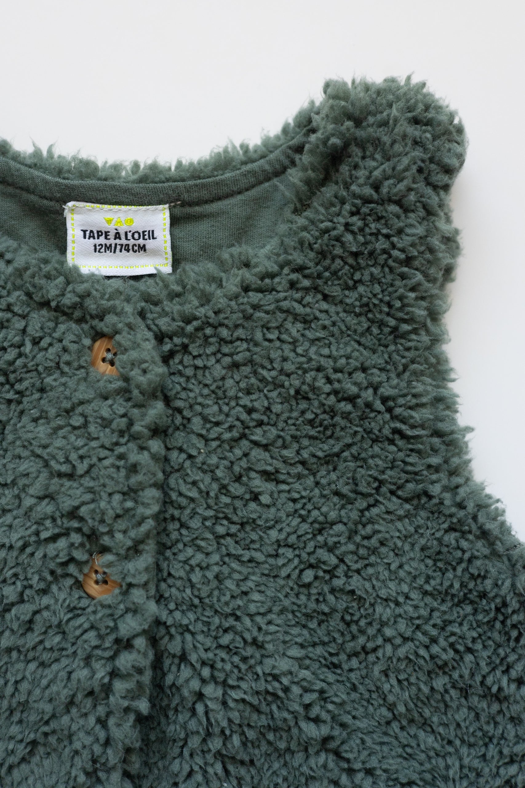 Tape à l’œil - veste sans manche 12M