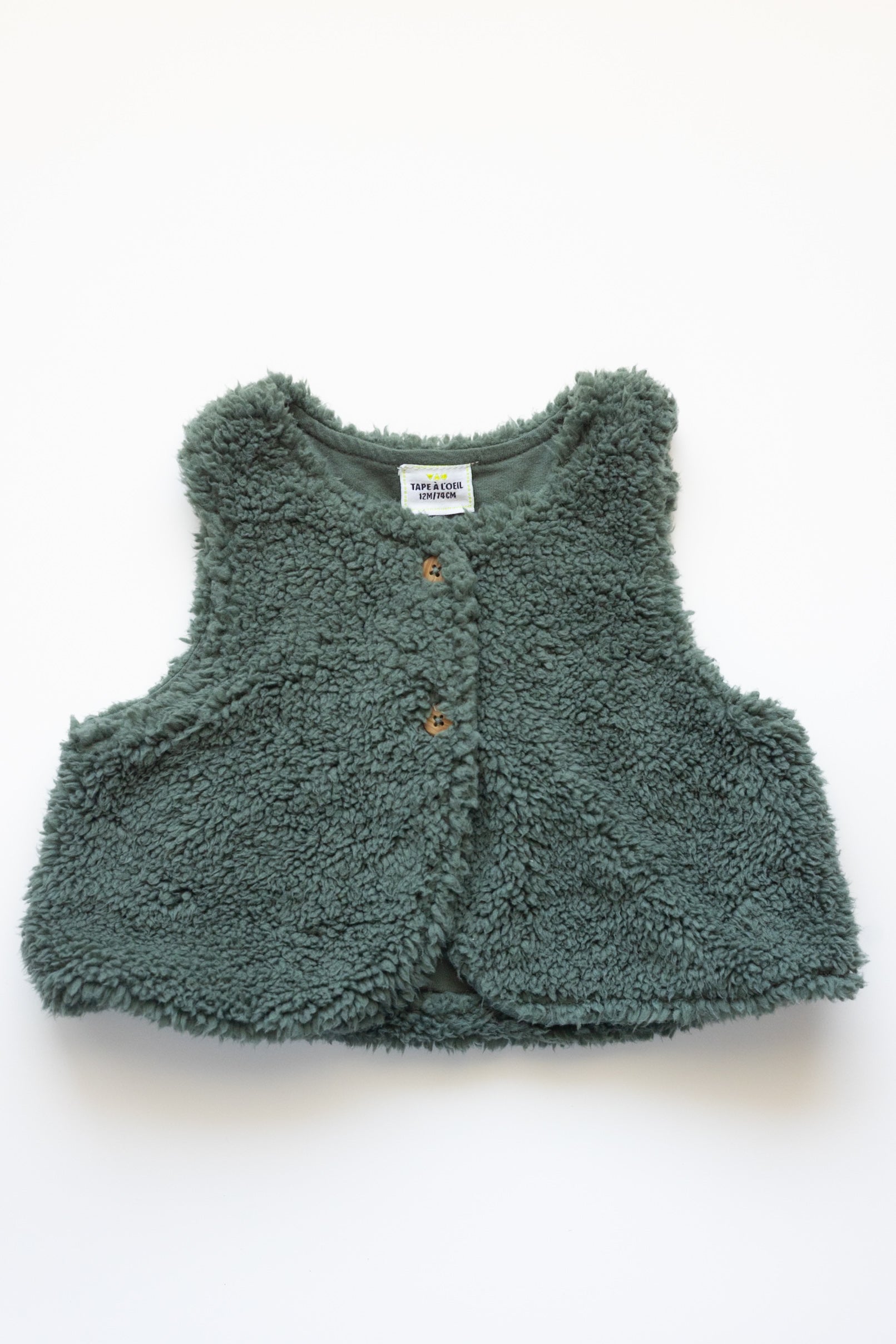 Tape à l’œil - veste sans manche 12M
