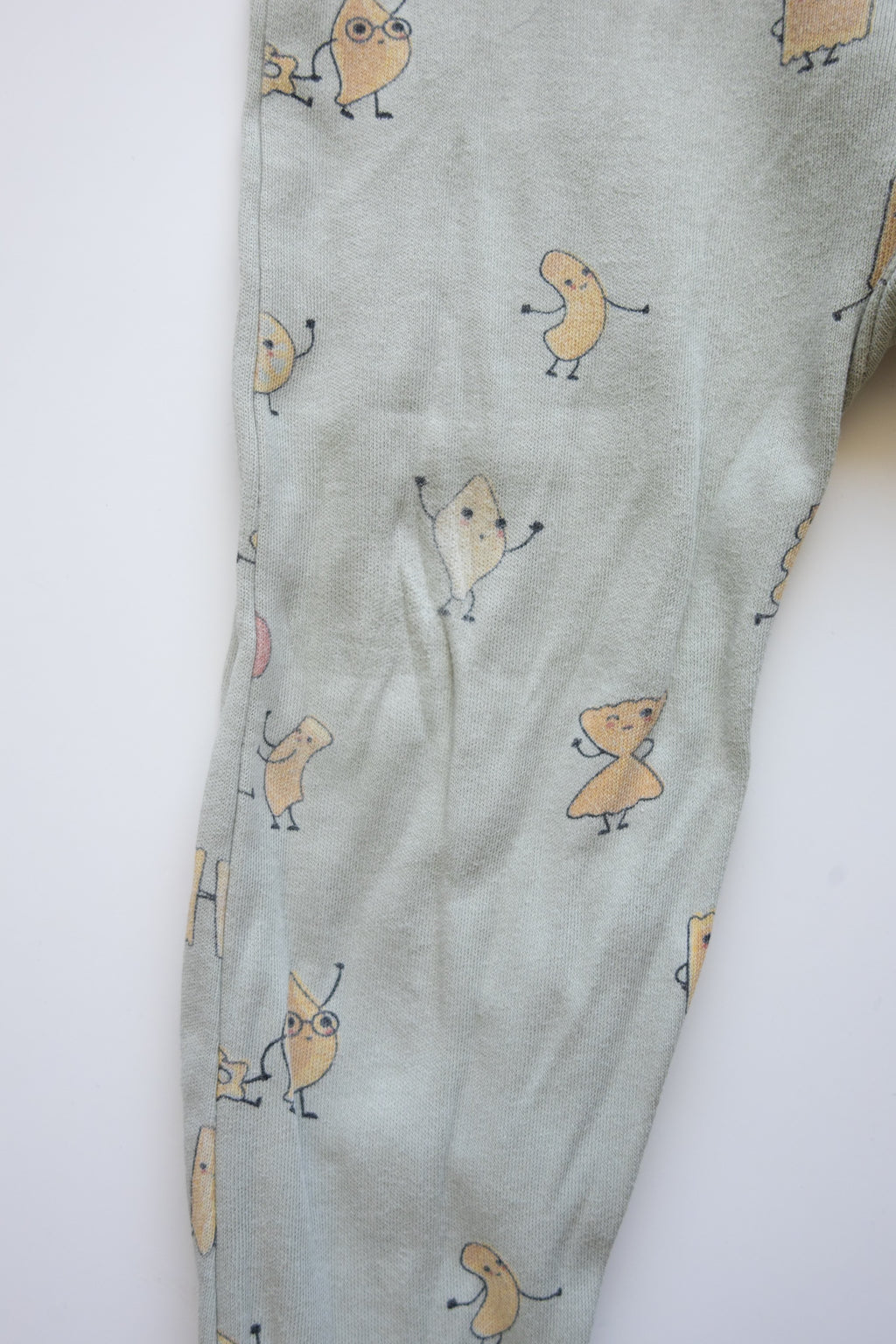 Roche ciseaux- pyjama 18M (décoloration aux genoux)